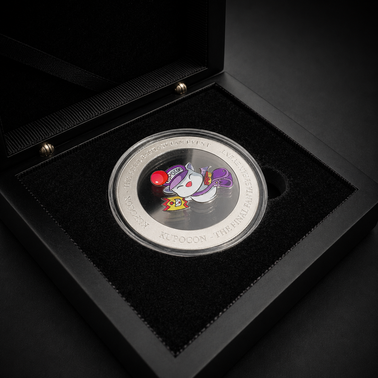 KupoCon 10 Year Anniversary commemorative silver-plated coin in a wooden display box with numbered collector's card